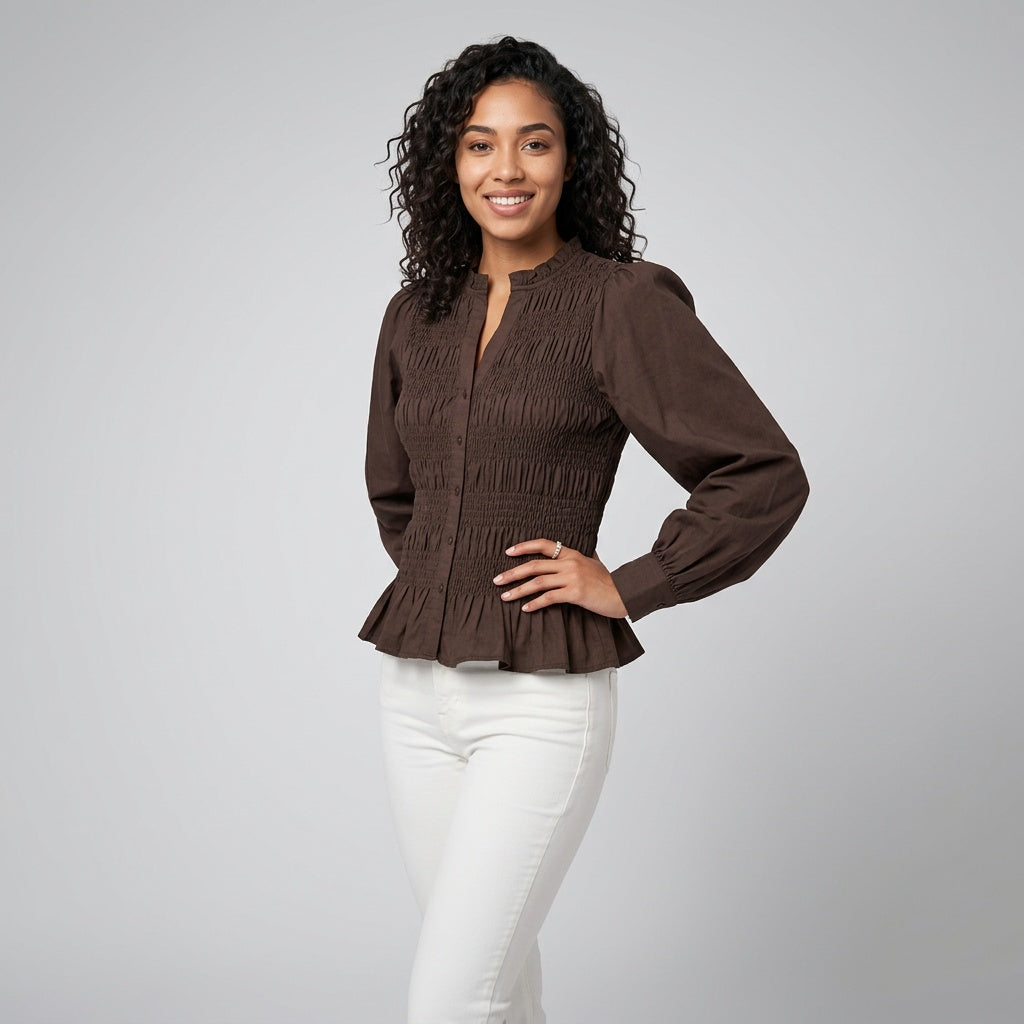 Professional e-commerce fashion photography — create a realistic product-on-model shot using the provided reference images. You are given 2 images: image 1 = product reference, image 2 = model reference. Dress the model from the second image in the product from the first image. The product must be physically placed on the model's body — worn naturally with correct fit, draping, and proportions as it would appear in real life. The product is the hero of the shot and must be clearly visible, prominently displ