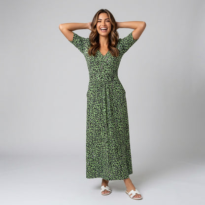 Professional e-commerce fashion photography — create a realistic product-on-model shot using the provided reference images. You are given 2 images: image 1 = product reference, image 2 = model reference. Dress the model from the second image in the product from the first image. The product must be physically placed on the model's body — worn naturally with correct fit, draping, and proportions as it would appear in real life. The product is the hero of the shot and must be clearly visible, prominently displ
