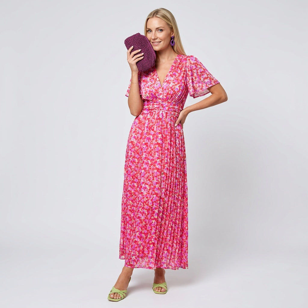Professional e-commerce fashion photography — create a realistic product-on-model shot using the provided reference images. You are given 2 images: image 1 = product reference, image 2 = model reference. Dress the model from the second image in the product from the first image. The product must be physically placed on the model's body — worn naturally with correct fit, draping, and proportions as it would appear in real life. The product is the hero of the shot and must be clearly visible, prominently displ
