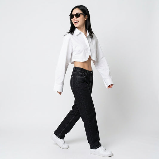 Professional e-commerce fashion photography — create a realistic product-on-model shot using the provided reference images. You are given 2 images: image 1 = product reference, image 2 = model reference. Dress the model from the second image in the product from the first image. The product must be physically placed on the model's body — worn naturally with correct fit, draping, and proportions as it would appear in real life. The product is the hero of the shot and must be clearly visible, prominently displ