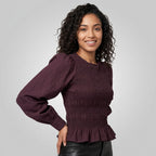 Professional e-commerce fashion photography — create a realistic product-on-model shot using the provided reference images. You are given 2 images: image 1 = product reference, image 2 = model reference. Dress the model from the second image in the product from the first image. The product must be physically placed on the model's body — worn naturally with correct fit, draping, and proportions as it would appear in real life. The product is the hero of the shot and must be clearly visible, prominently displ
