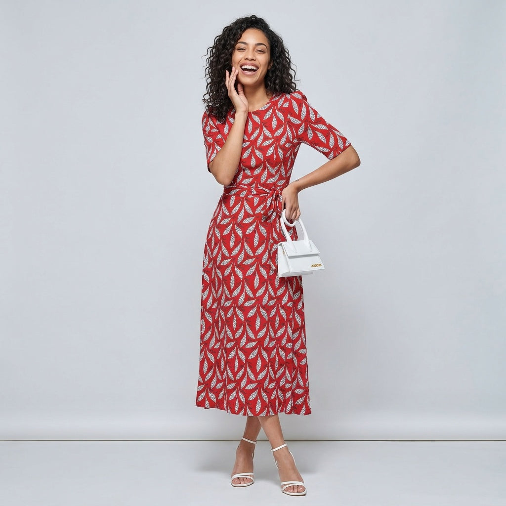 Professional e-commerce fashion photography — create a realistic product-on-model shot using the provided reference images. You are given 2 images: image 1 = product reference, image 2 = model reference. Dress the model from the second image in the product from the first image. The product must be physically placed on the model's body — worn naturally with correct fit, draping, and proportions as it would appear in real life. The product is the hero of the shot and must be clearly visible, prominently displ