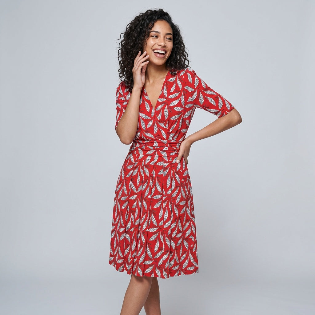 Professional e-commerce fashion photography — create a realistic product-on-model shot using the provided reference images. You are given 2 images: image 1 = product reference, image 2 = model reference. Dress the model from the second image in the product from the first image. The product must be physically placed on the model's body — worn naturally with correct fit, draping, and proportions as it would appear in real life. The product is the hero of the shot and must be clearly visible, prominently displ