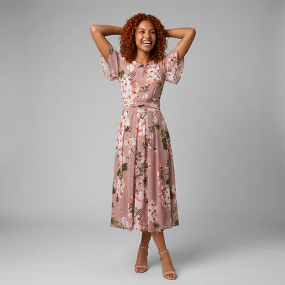 Professional e-commerce fashion photography — create a realistic product-on-model shot using the provided reference images. You are given 2 images: image 1 = product reference, image 2 = model reference. Dress the model from the second image in the product from the first image. The product must be physically placed on the model's body — worn naturally with correct fit, draping, and proportions as it would appear in real life. The product is the hero of the shot and must be clearly visible, prominently displ