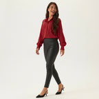 Professional e-commerce product photography, edit the provided images. Use the provided image as the product. Preserve the exact product shape, logo, colors, textures, and proportions. Do not alter, reshape, recolor, or add features to the product. full body shot, head to toe, complete figure visible. joyful expressive face, laughing or mid-laugh, candid emotion. casual walking stride, slight hip sway, arms relaxed at sides, head turned to the side, natural mid-walk pose. three-quarter view, slight body rot