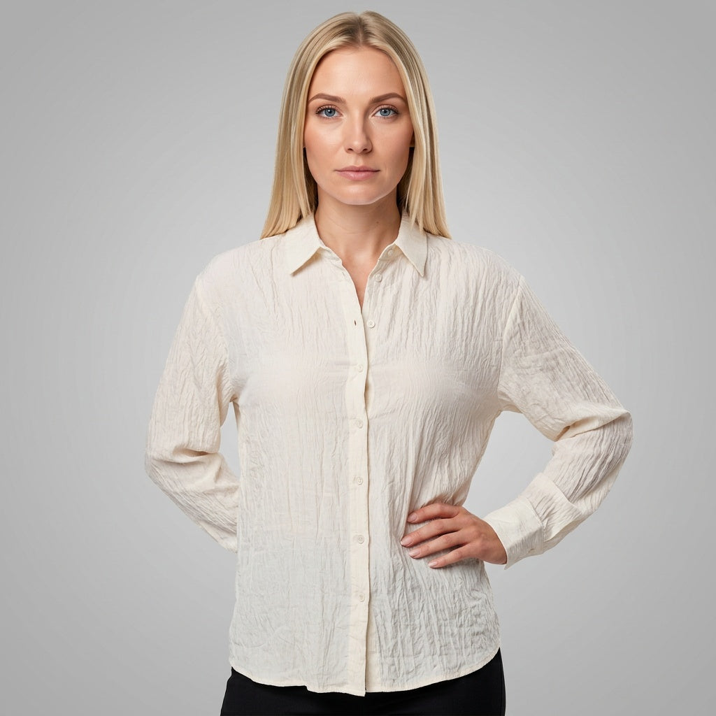 Professional e-commerce fashion photography — create a realistic product-on-model shot using the provided reference images. You are given 2 images: image 1 = product reference, image 2 = model reference. Dress the model from the second image in the product from the first image. The product must be physically placed on the model's body — worn naturally with correct fit, draping, and proportions as it would appear in real life. The product is the hero of the shot and must be clearly visible, prominently displ