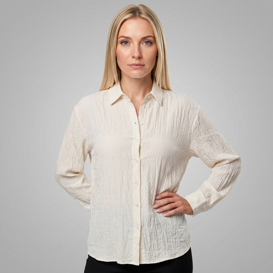 Professional e-commerce fashion photography — create a realistic product-on-model shot using the provided reference images. You are given 2 images: image 1 = product reference, image 2 = model reference. Dress the model from the second image in the product from the first image. The product must be physically placed on the model's body — worn naturally with correct fit, draping, and proportions as it would appear in real life. The product is the hero of the shot and must be clearly visible, prominently displ