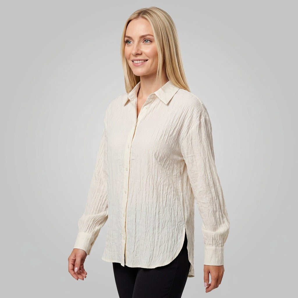 Professional e-commerce fashion photography — create a realistic product-on-model shot using the provided reference images. You are given 2 images: image 1 = product reference, image 2 = model reference. Dress the model from the second image in the product from the first image. The product must be physically placed on the model's body — worn naturally with correct fit, draping, and proportions as it would appear in real life. The product is the hero of the shot and must be clearly visible, prominently displ