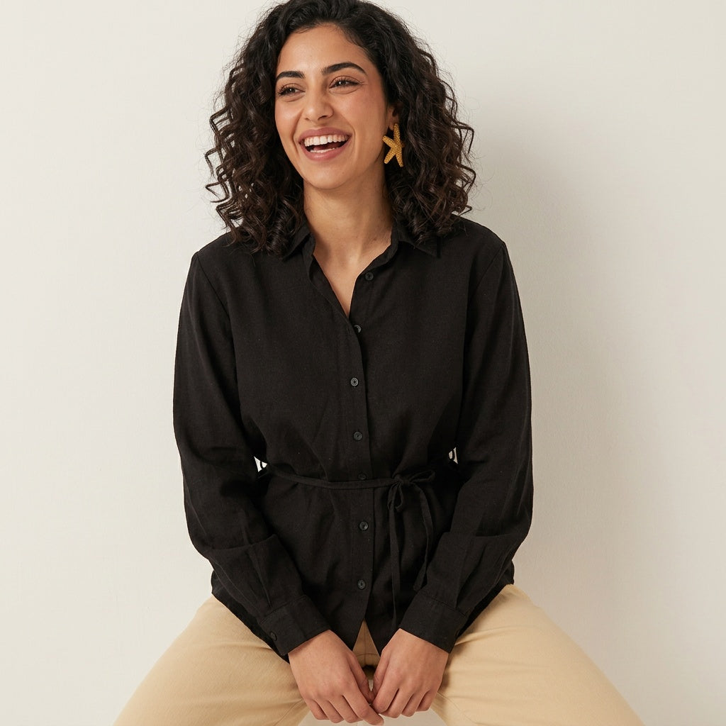 Professional e-commerce fashion photography — create a realistic product-on-model shot using the provided reference images. You are given 2 images: image 1 = product reference, image 2 = model reference. Dress the model from the second image in the product from the first image. The product must be physically placed on the model's body — worn naturally with correct fit, draping, and proportions as it would appear in real life. The product is the hero of the shot and must be clearly visible, prominently displ