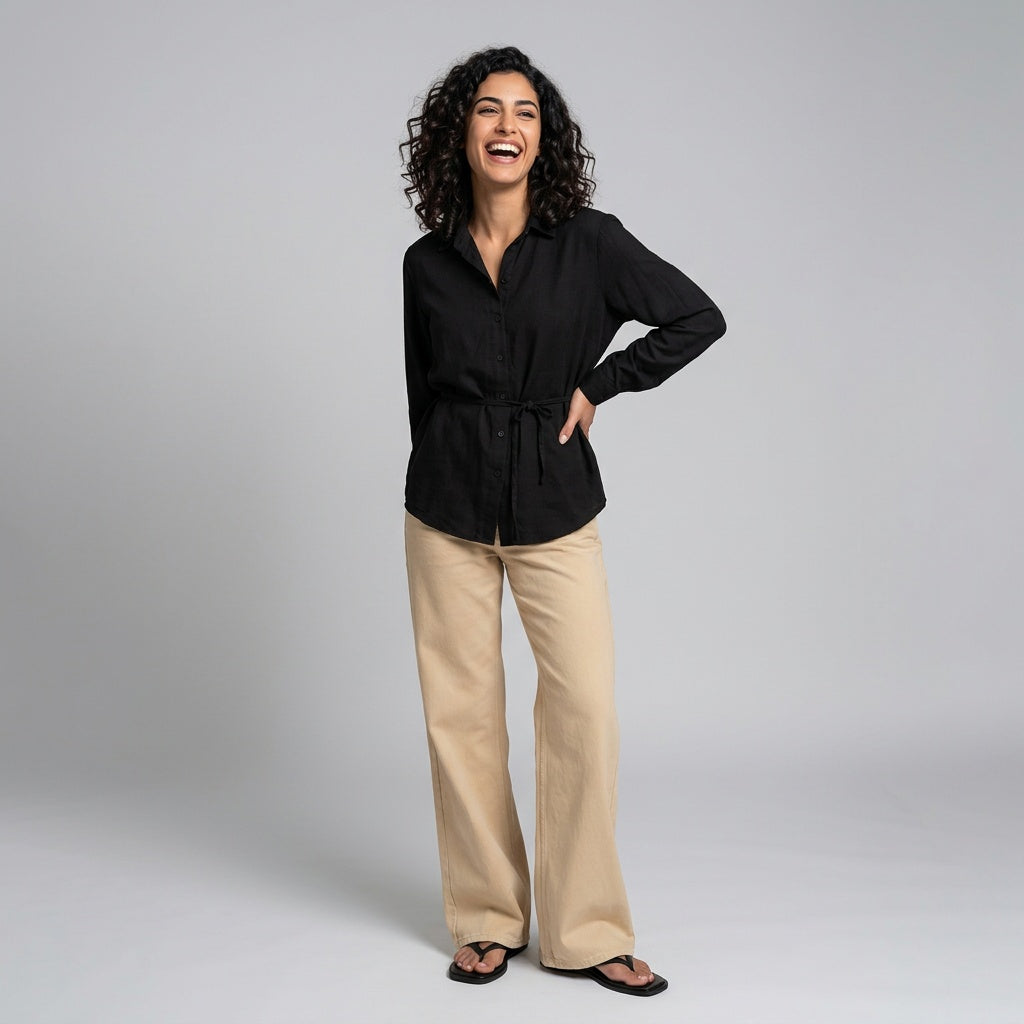 Professional e-commerce fashion photography — create a realistic product-on-model shot using the provided reference images. You are given 2 images: image 1 = product reference, image 2 = model reference. Dress the model from the second image in the product from the first image. The product must be physically placed on the model's body — worn naturally with correct fit, draping, and proportions as it would appear in real life. The product is the hero of the shot and must be clearly visible, prominently displ