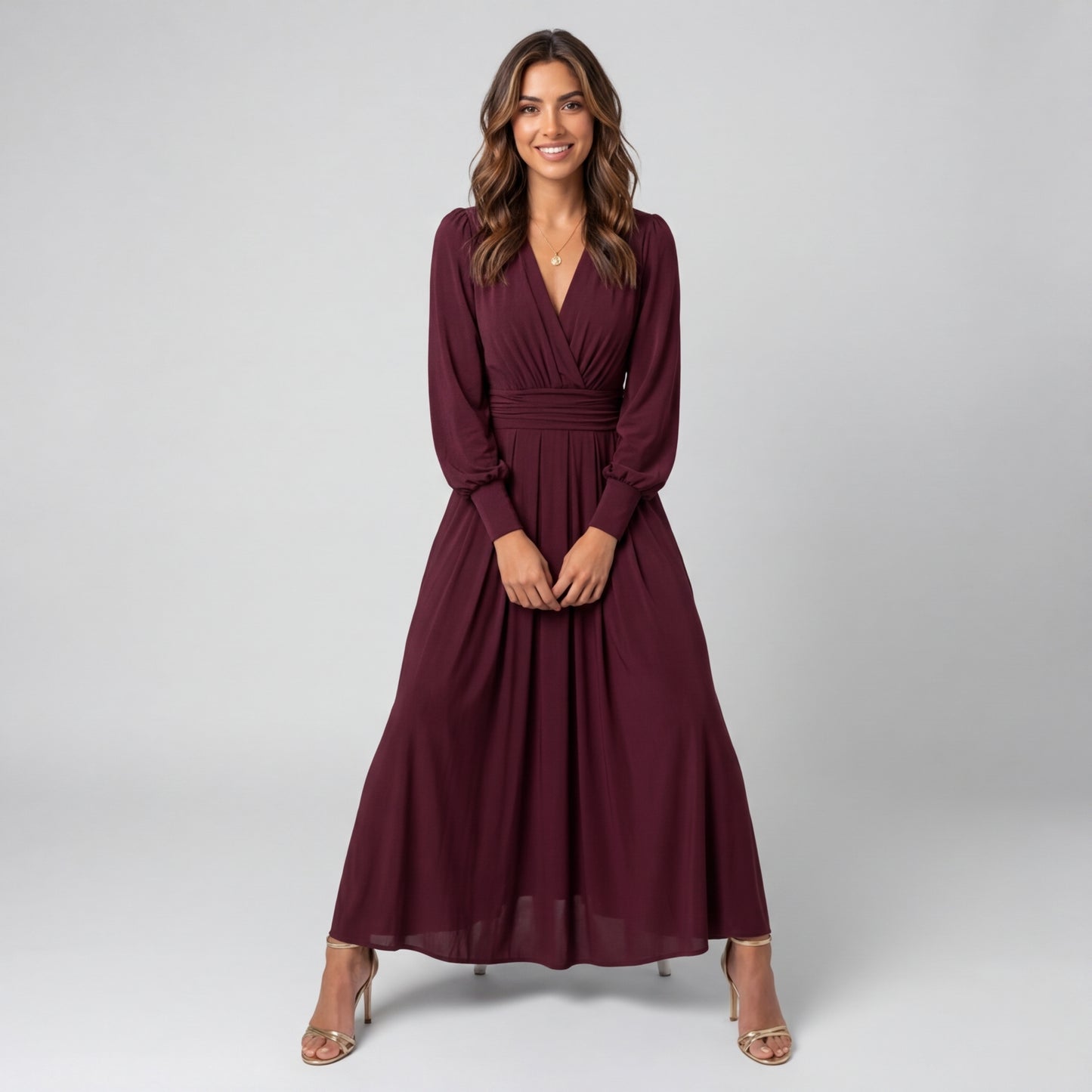 Professional e-commerce fashion photography — create a realistic product-on-model shot using the provided reference images. You are given 2 images: image 1 = product reference, image 2 = model reference. Dress the model from the second image in the product from the first image. The product must be physically placed on the model's body — worn naturally with correct fit, draping, and proportions as it would appear in real life. The product is the hero of the shot and must be clearly visible, prominently displ