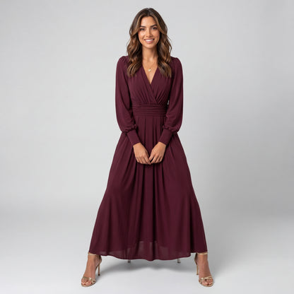 Professional e-commerce fashion photography — create a realistic product-on-model shot using the provided reference images. You are given 2 images: image 1 = product reference, image 2 = model reference. Dress the model from the second image in the product from the first image. The product must be physically placed on the model's body — worn naturally with correct fit, draping, and proportions as it would appear in real life. The product is the hero of the shot and must be clearly visible, prominently displ