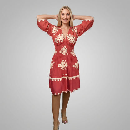 Professional e-commerce fashion photography — create a realistic product-on-model shot using the provided reference images. You are given 2 images: image 1 = product reference, image 2 = model reference. Dress the model from the second image in the product from the first image. The product must be physically placed on the model's body — worn naturally with correct fit, draping, and proportions as it would appear in real life. The product is the hero of the shot and must be clearly visible, prominently displ