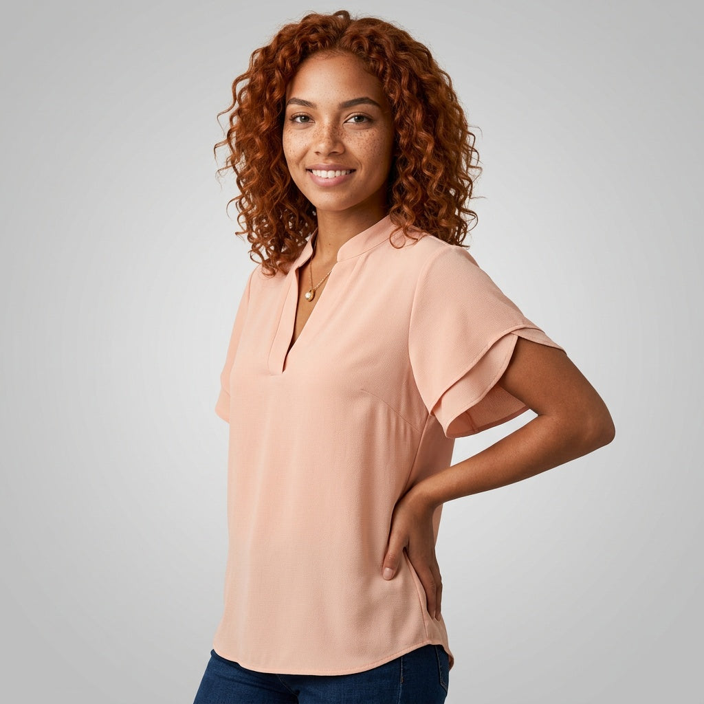 Professional e-commerce fashion photography — create a realistic product-on-model shot using the provided reference images. You are given 2 images: image 1 = product reference, image 2 = model reference. Dress the model from the second image in the product from the first image. The product must be physically placed on the model's body — worn naturally with correct fit, draping, and proportions as it would appear in real life. The product is the hero of the shot and must be clearly visible, prominently displ