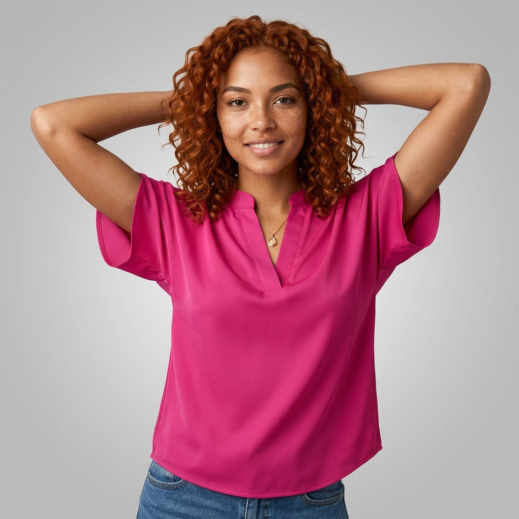 Professional e-commerce fashion photography — create a realistic product-on-model shot using the provided reference images. You are given 2 images: image 1 = product reference, image 2 = model reference. Dress the model from the second image in the product from the first image. The product must be physically placed on the model's body — worn naturally with correct fit, draping, and proportions as it would appear in real life. The product is the hero of the shot and must be clearly visible, prominently displ