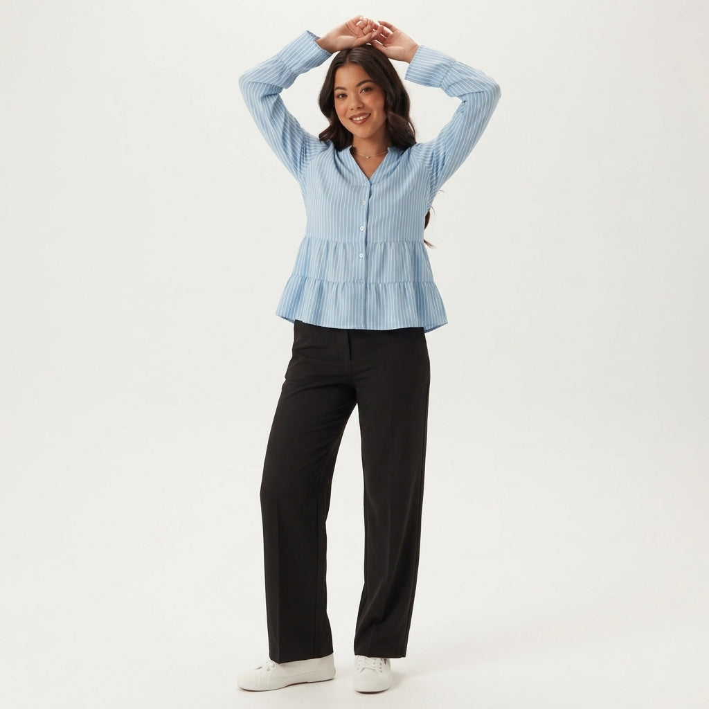 Professional e-commerce product photography, edit the provided images. You are given 4 images: image 1 = product reference, image 2 = product reference, image 3 = product reference, image 4 = product reference. Use the product images (images 1, 2, 3, 4) as the product. Preserve the exact product shape, logo, colors, textures, and proportions. Do not alter, reshape, recolor, or add features to the product. full body shot, head to toe, complete figure visible. natural warm smile, approachable and friendly exp