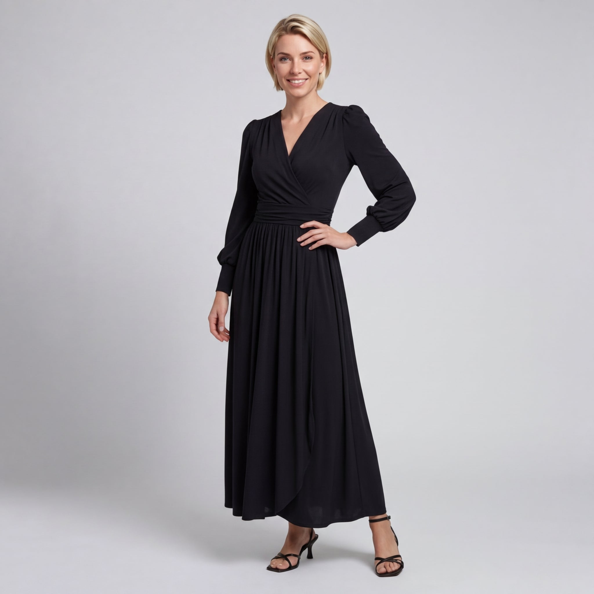 Professional e-commerce fashion photography — create a realistic product-on-model shot using the provided reference images. You are given 2 images: image 1 = product reference, image 2 = model reference. Dress the model from the second image in the product from the first image. The product must be physically placed on the model's body — worn naturally with correct fit, draping, and proportions as it would appear in real life. The product is the hero of the shot and must be clearly visible, prominently displ